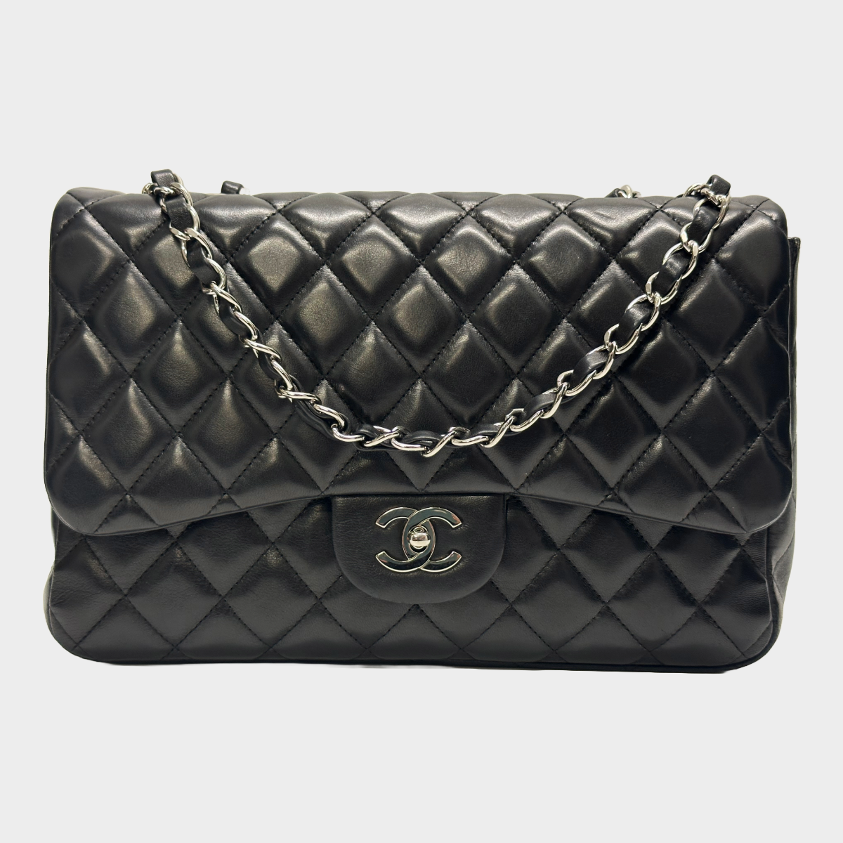 image of Chanel women's black lambskin leather jumbo classic flap handbag