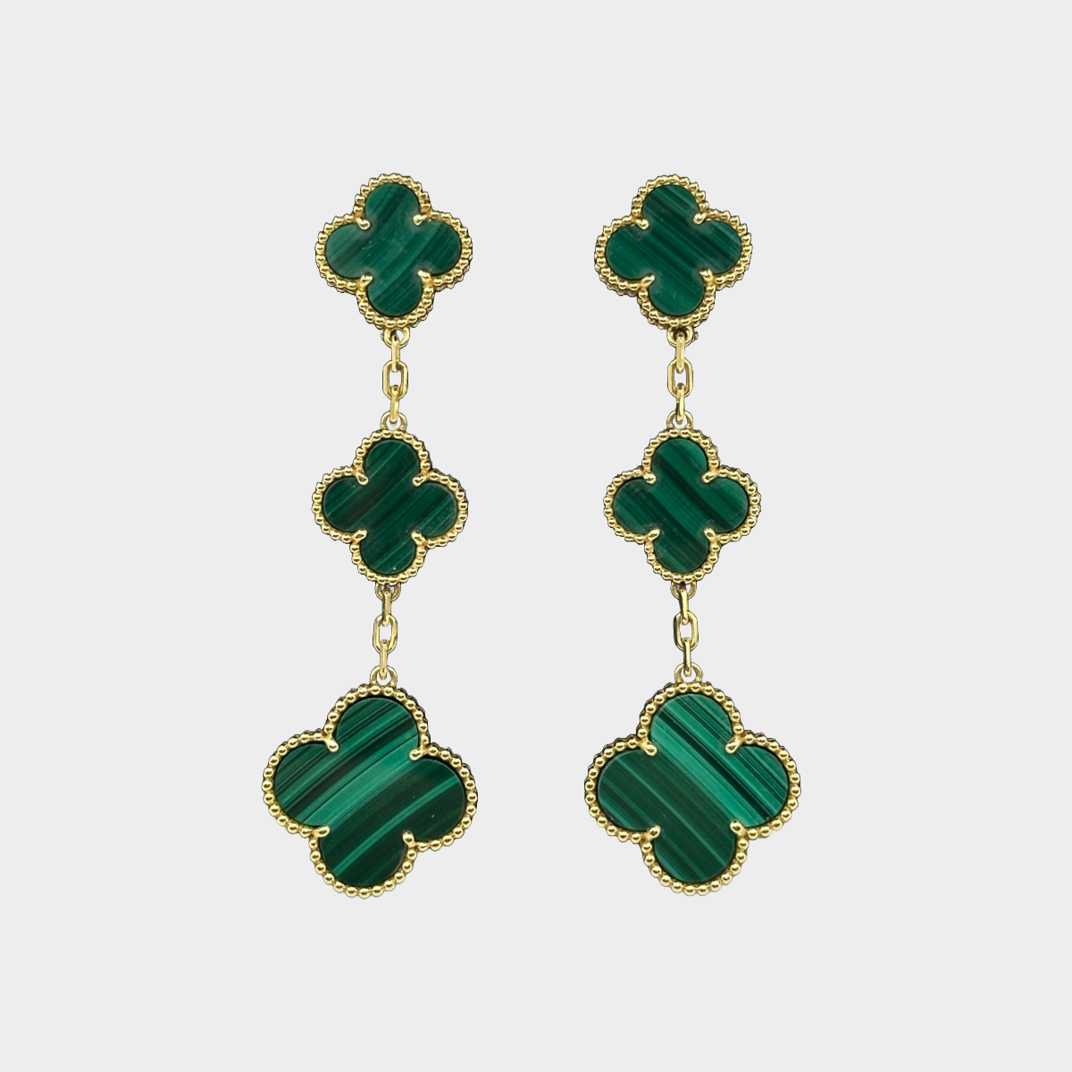 image of Van Cleef & Arpels 18K yellow gold and Malachite Magic Alhambra earrings