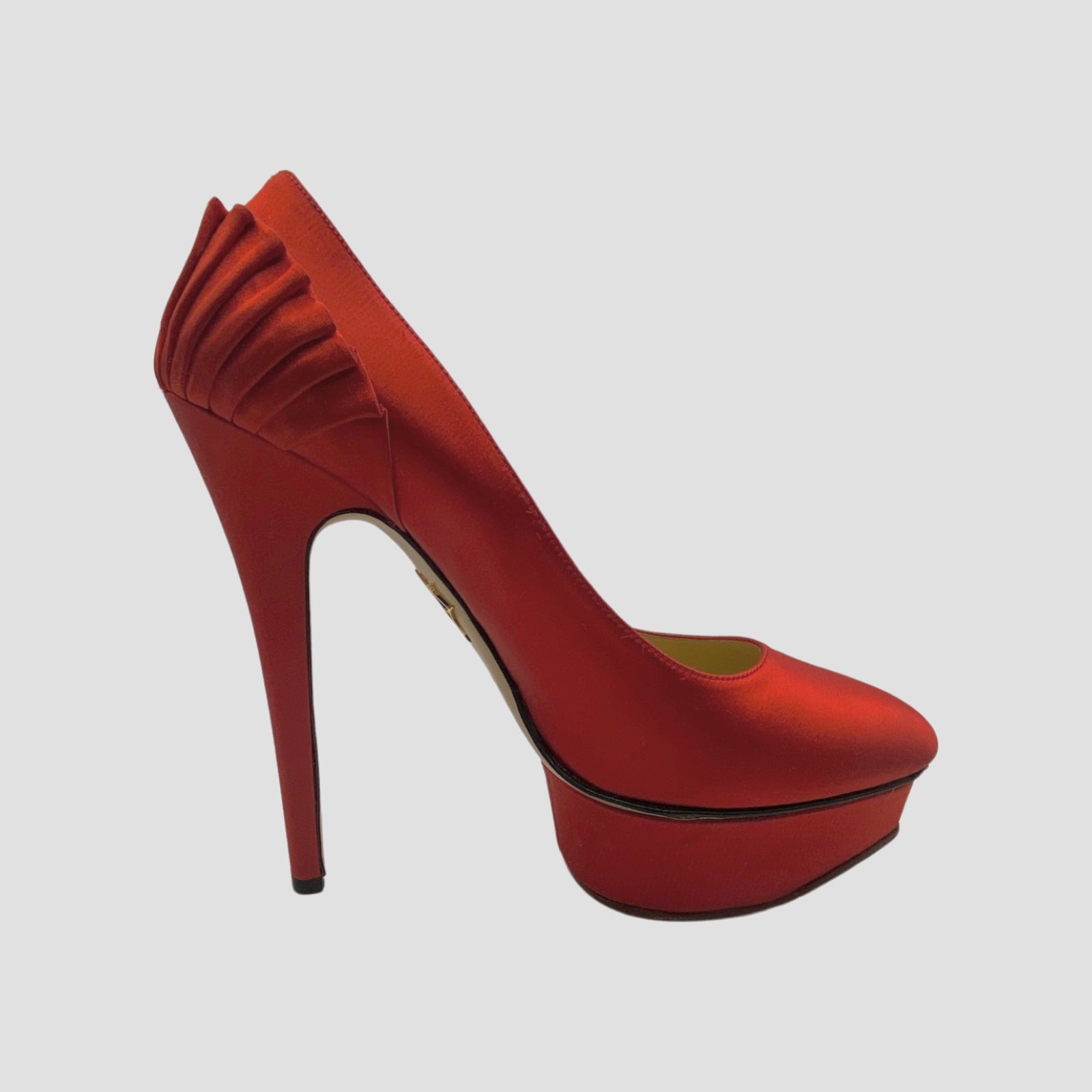 image of Charlotte Olympia red satin platform heels