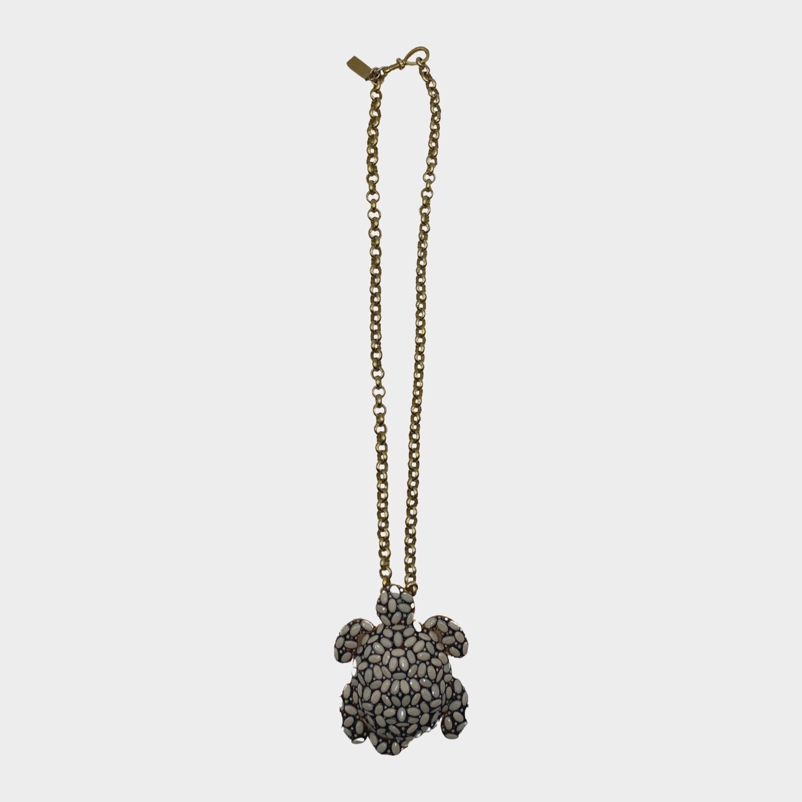 Image of Begum Khan women's white beaded 'Tortuga' turtle charm necklace on gold chain