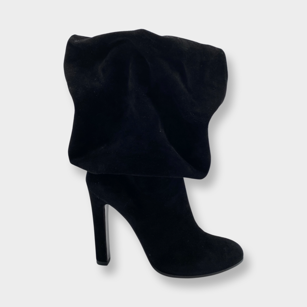 image of ALAÏA black suede heeled boots with oversized ankle design