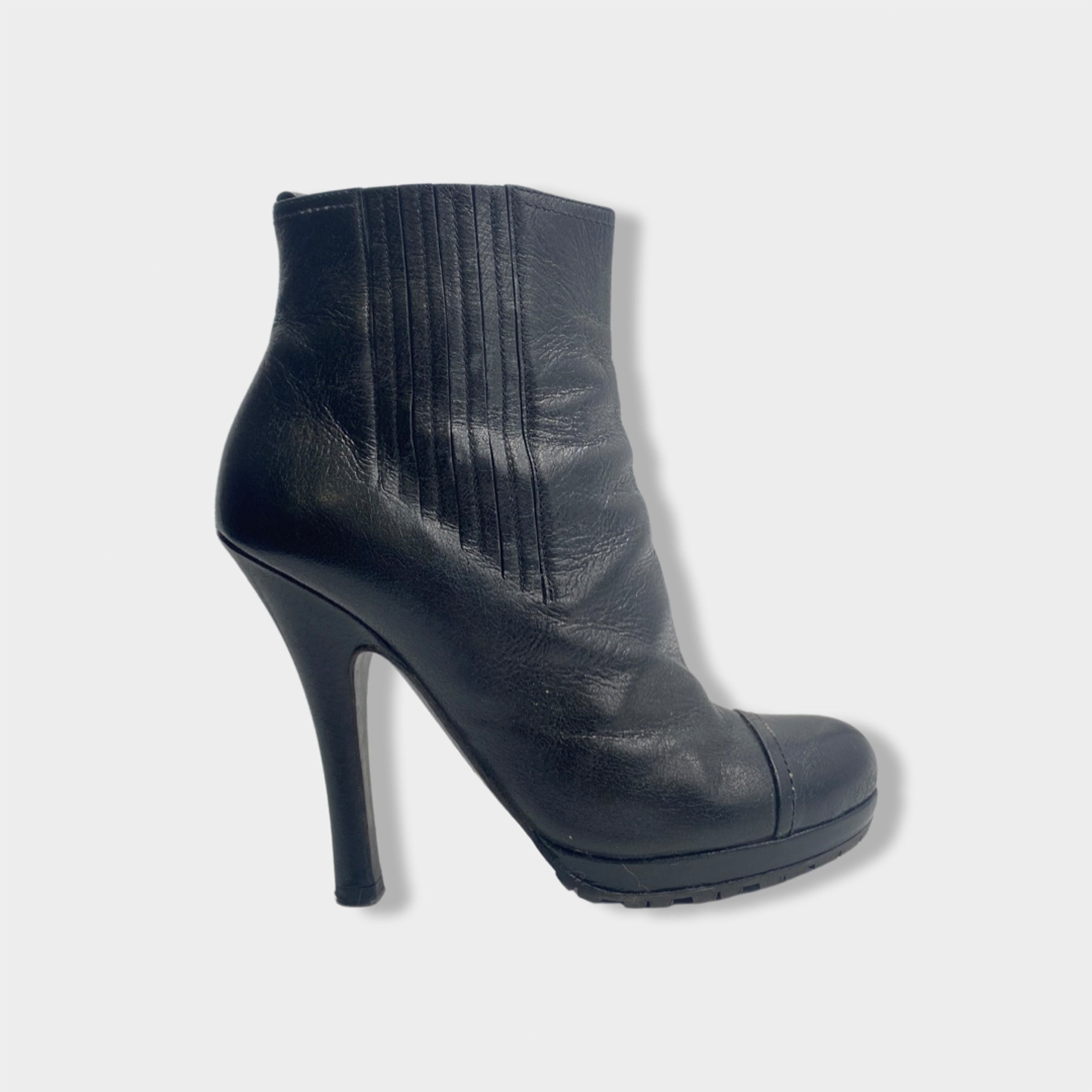 image of PRADA black leather ankle boots