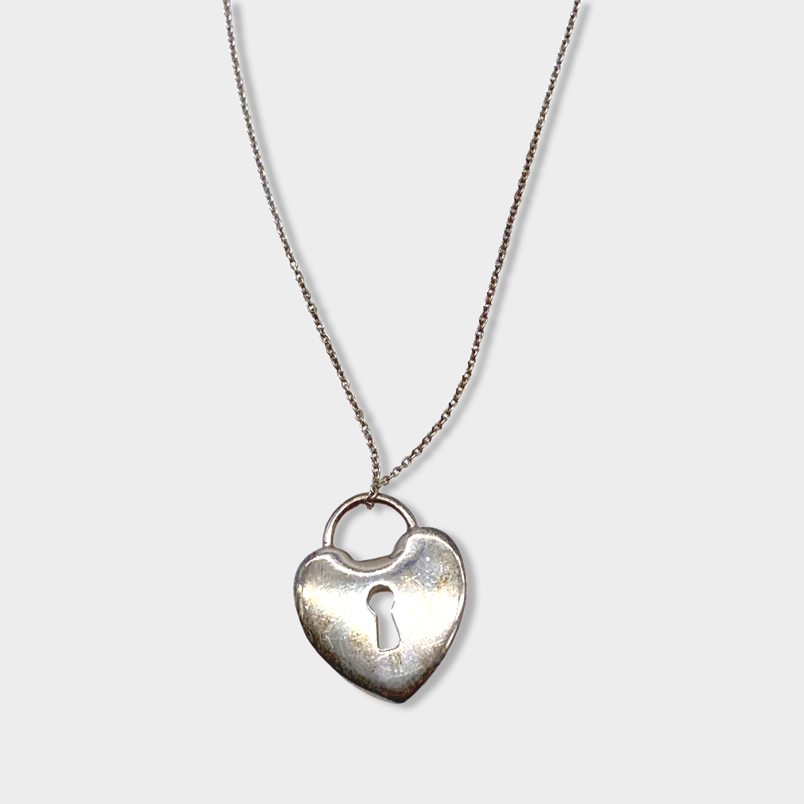 Image of TIFFANY & CO SILVER CHARM NECKLACE