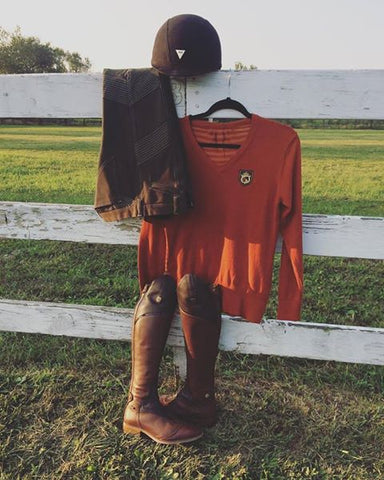 Fall Equestrian Riding Sweater in Autumn Maple by Equestrianista paired with Mountain Horse Sovereign Field Boots and GhoDho Breeches in Military.