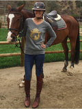 The Stylish Equestrian schooling in the Equestrianista Glitter Logo Sweatshirt.