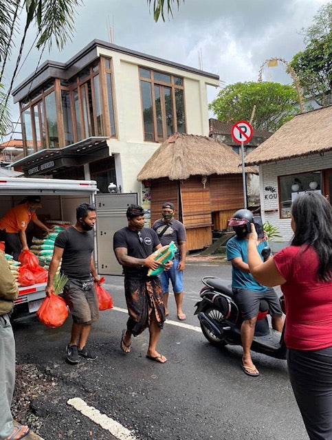 Unloading food parcels from a van