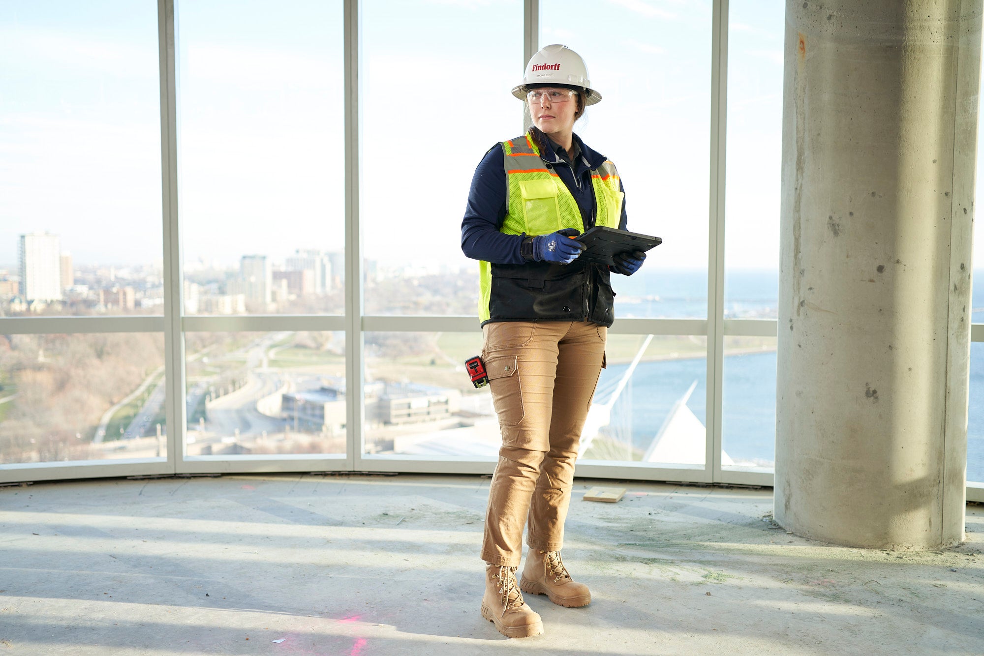 ‎Brooke Scott inspects The Couture high-rise in her Horizon Safety Boots from Xena Workwear