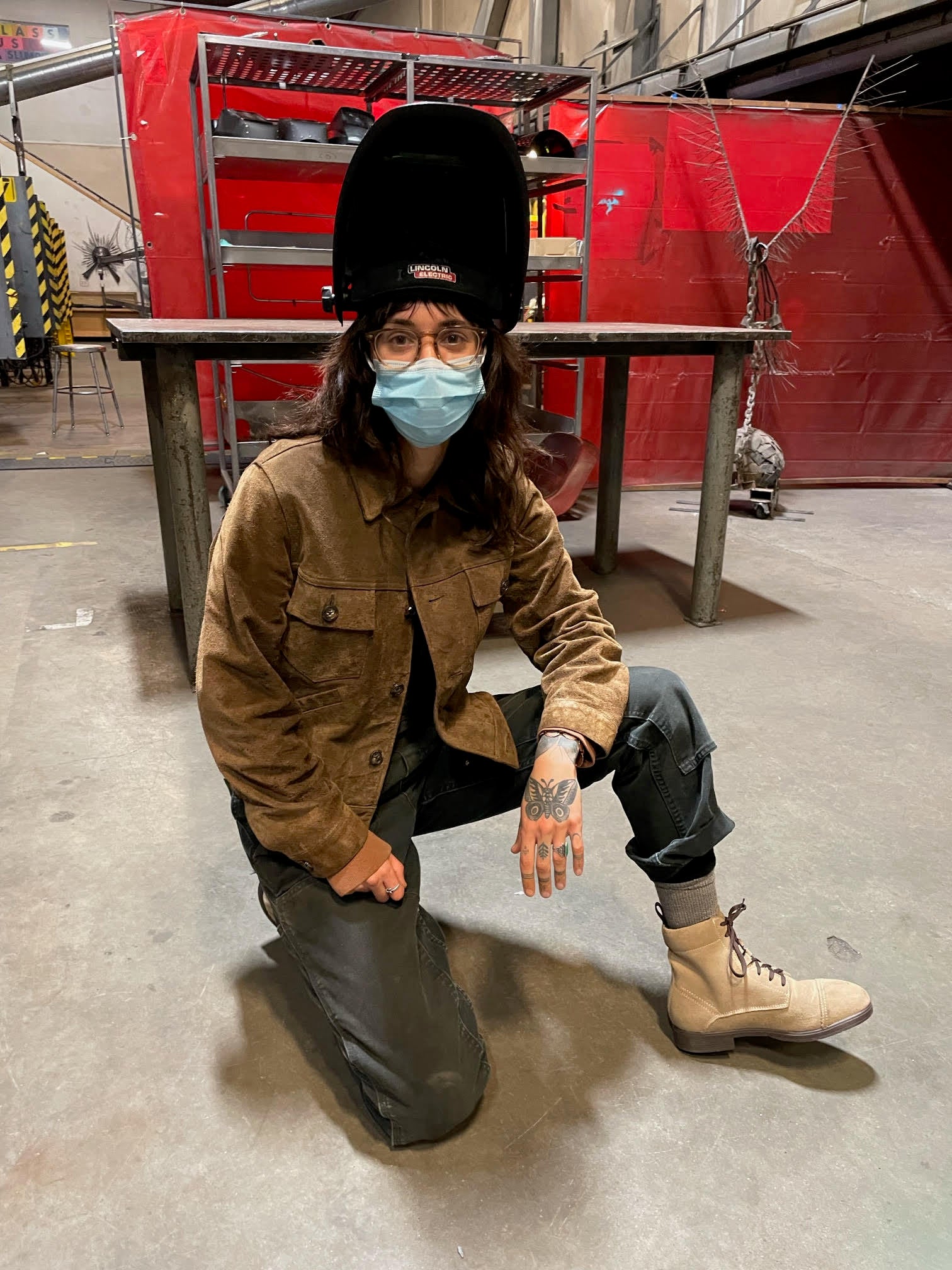 Woman Welder wearing Xena Workwear boots