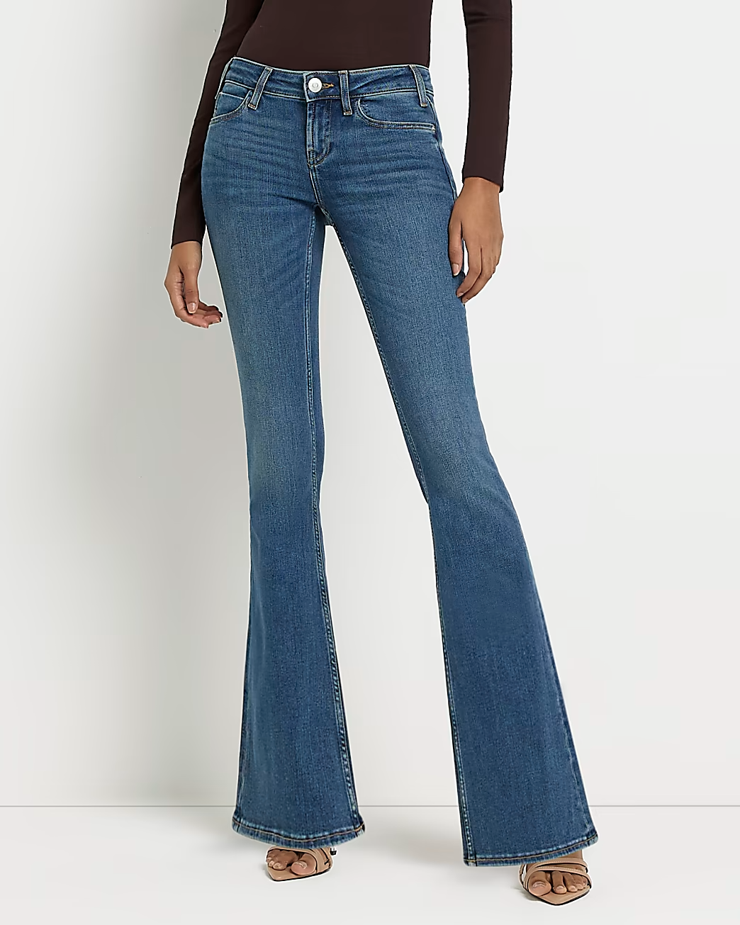 BLUE LOW RISE FLARED JEANS
