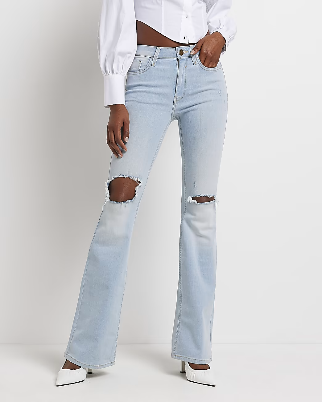 BLUE RIPPED MID RISE FLARED JEANS