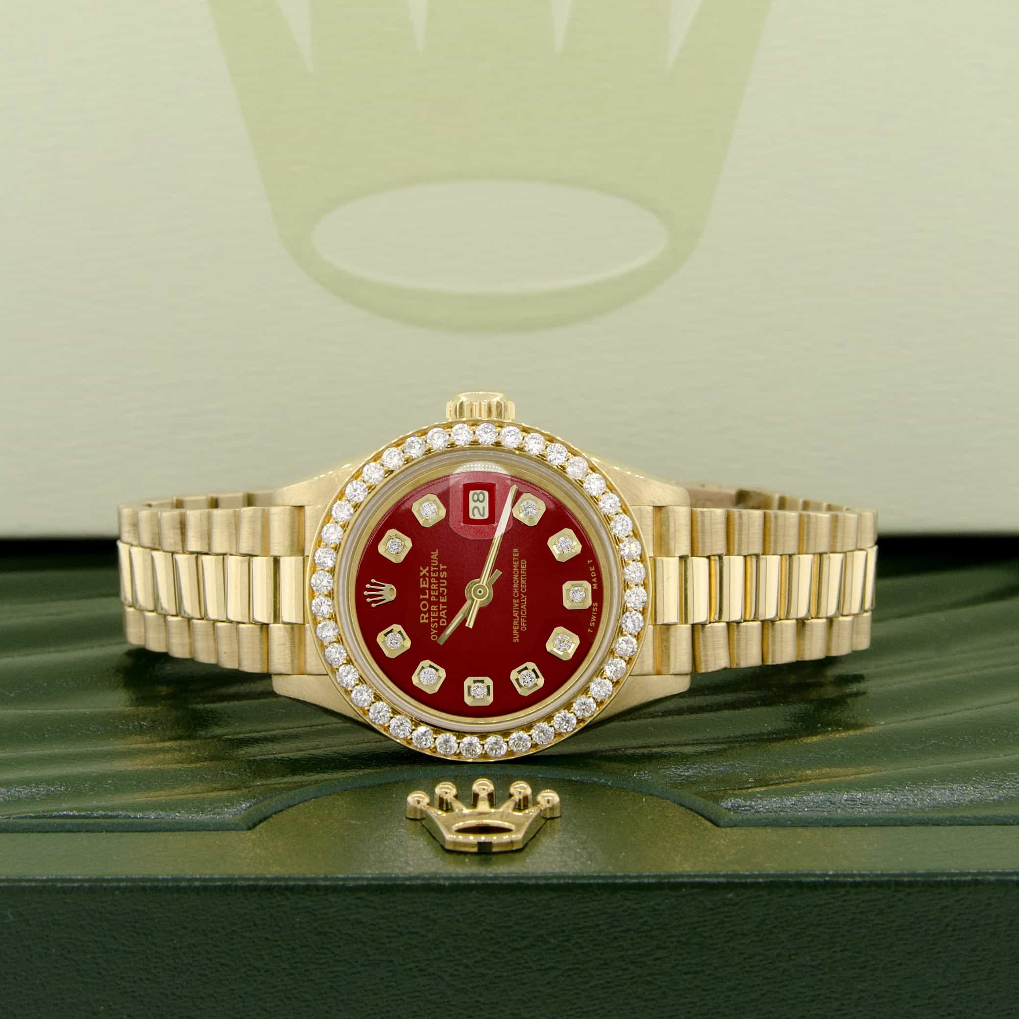 presidential rolex red face diamond bezel