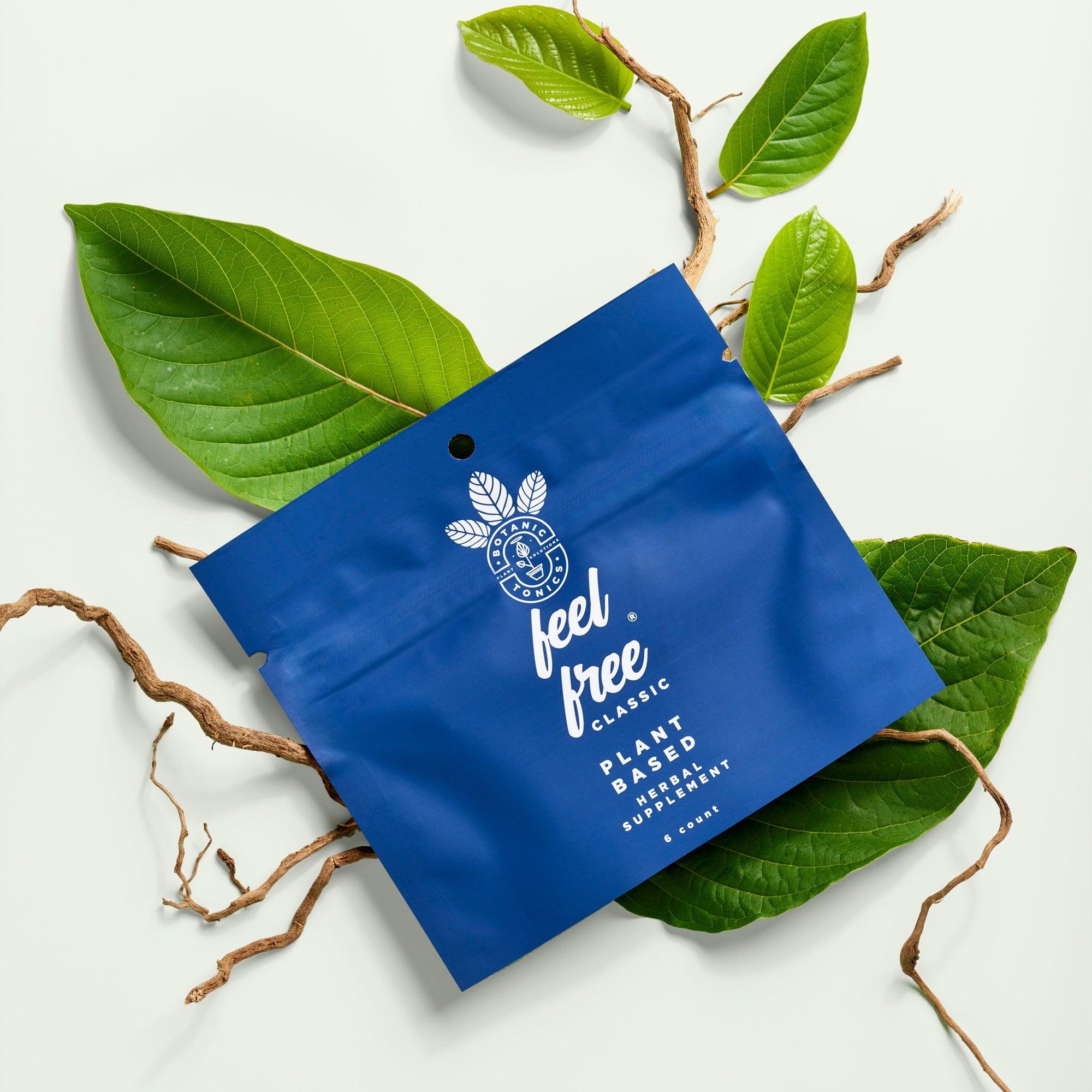 feel free classic wellness capsules  - pouch on leaves