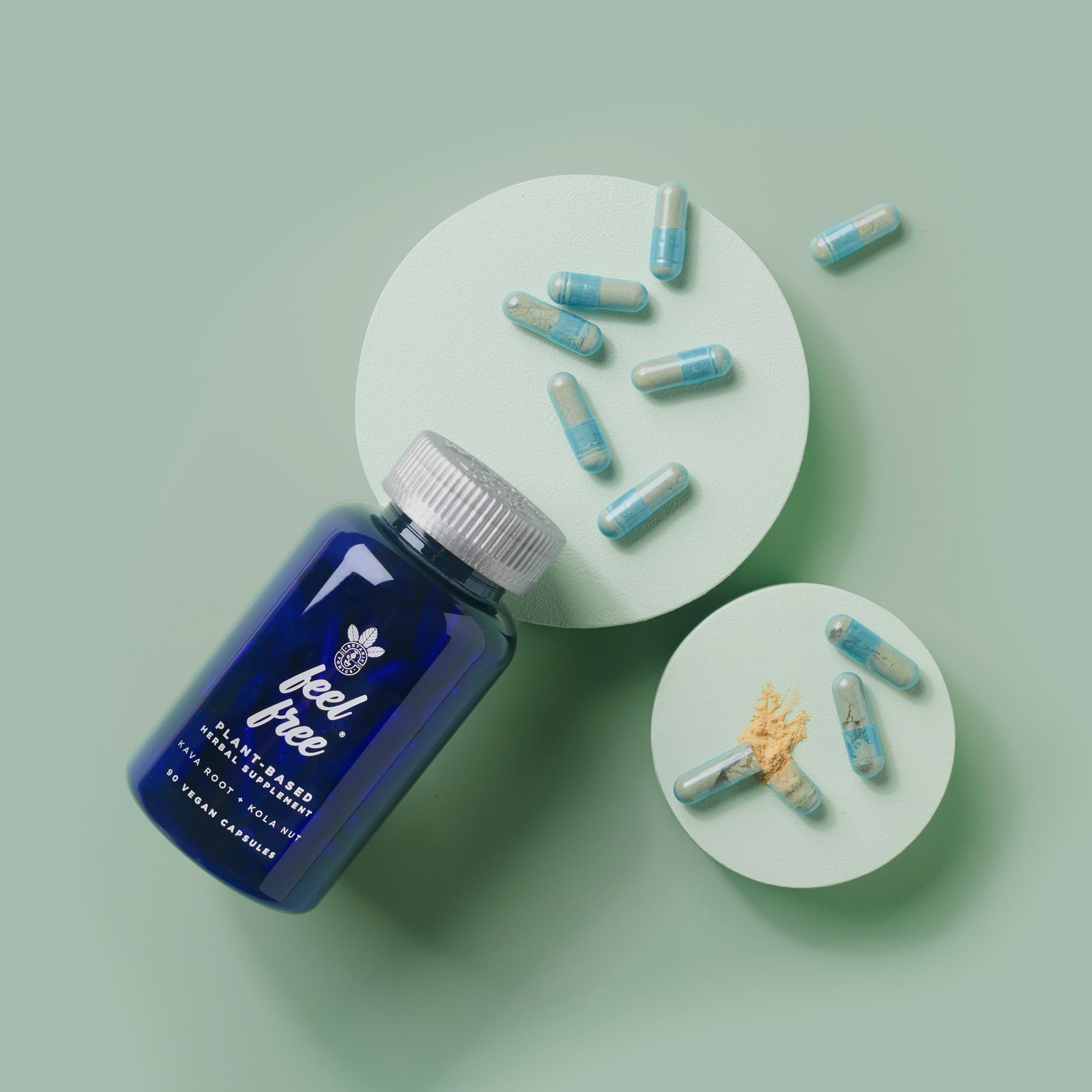 feel free wellness capsules - bottle on twigs