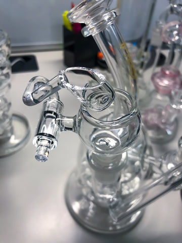 Honey Bucket Quartz banger with dome on desk and 9mm to 19mm adapter