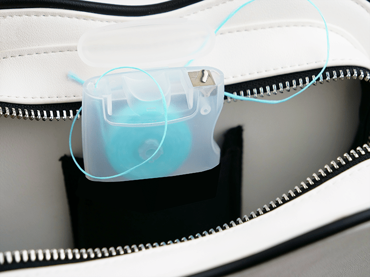 dental floss pouch inside purse