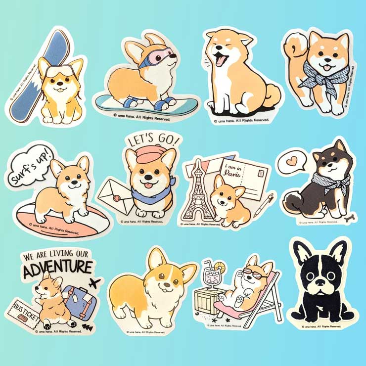 Twelve puppy stickers on a blue background