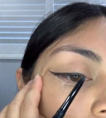 Step two: apply eyeliner