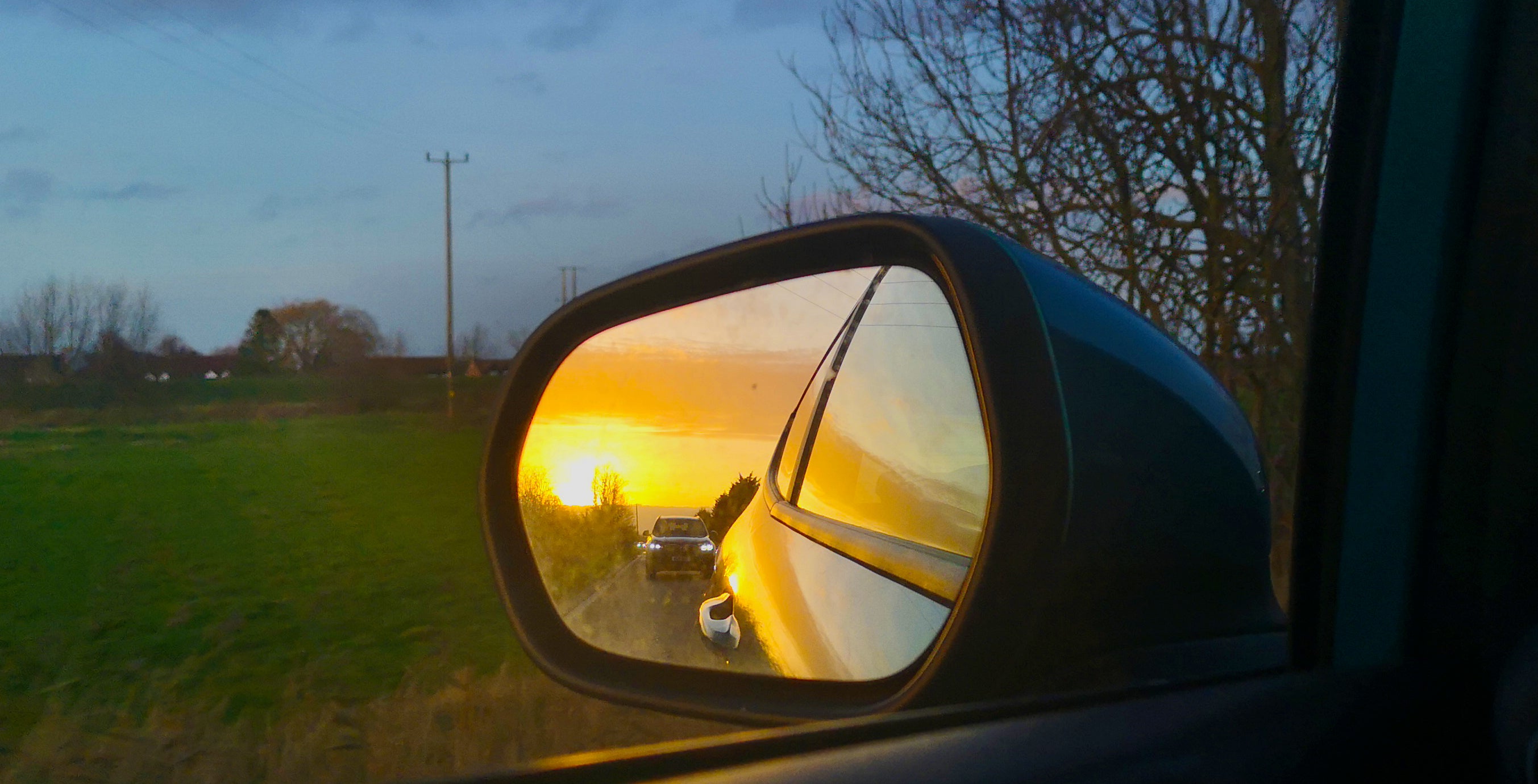 last sun set of the year in the rear view mirror