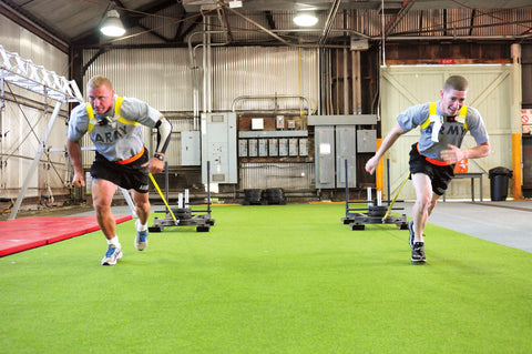 Army Pulling Sleds in CrossFit workout