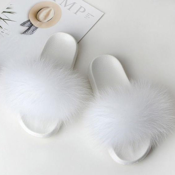 white fur slippers