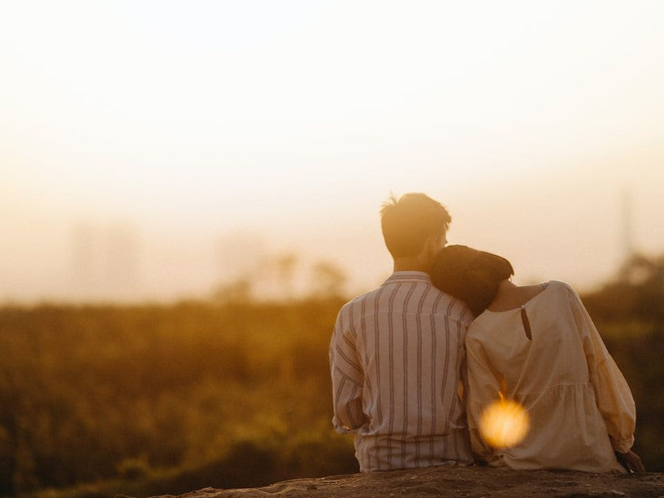 golden hour photoshoot of a young couple in love