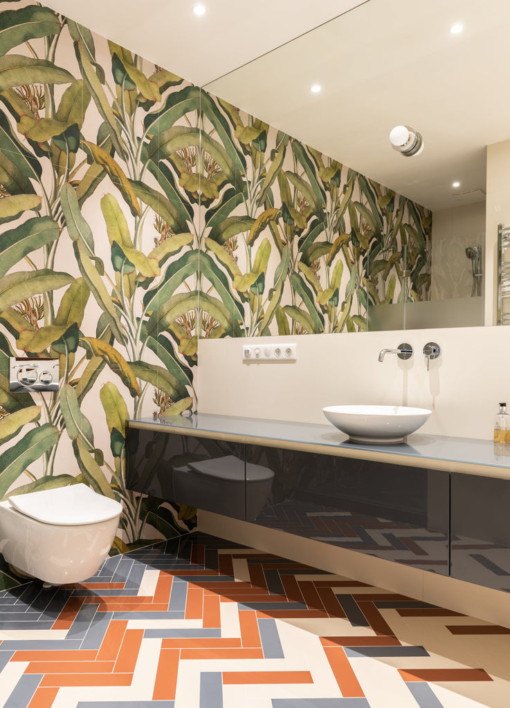 bathroom with bold floral accent wall