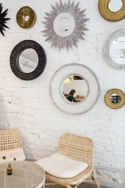 Cluster Small Mirrors to Fill A Space Stylishly