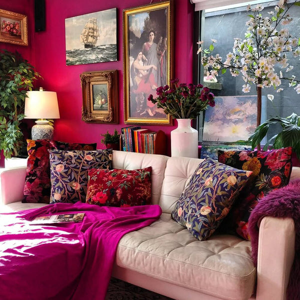 Maximalist interior with a unified color palette and art wall