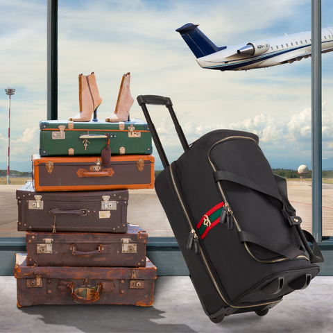 Stryker Roller Duffel in Airport leaning against vintage luggage as a plane takes off in the background