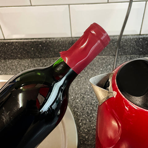 Steaming the Shrink Cap onto the kettle