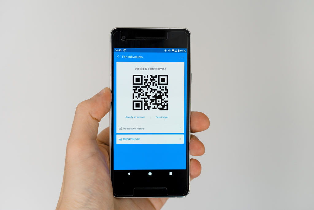 An image of a QR code displayed on a smartphone