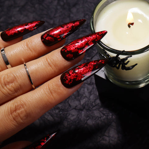 Halloween-foil-flakes-red-nail-design