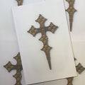 Front cover of Crosses featuring an antique cross on a white beackground.