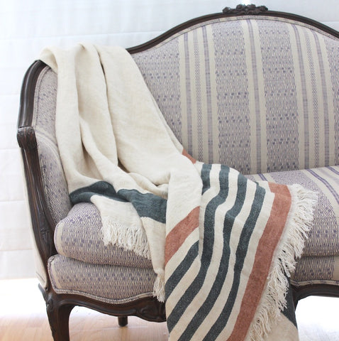 Libeco Belgian linen throw blanket on a sofa