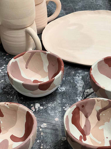 glazing handmade ceramic mugs and handmade ceramics bowls