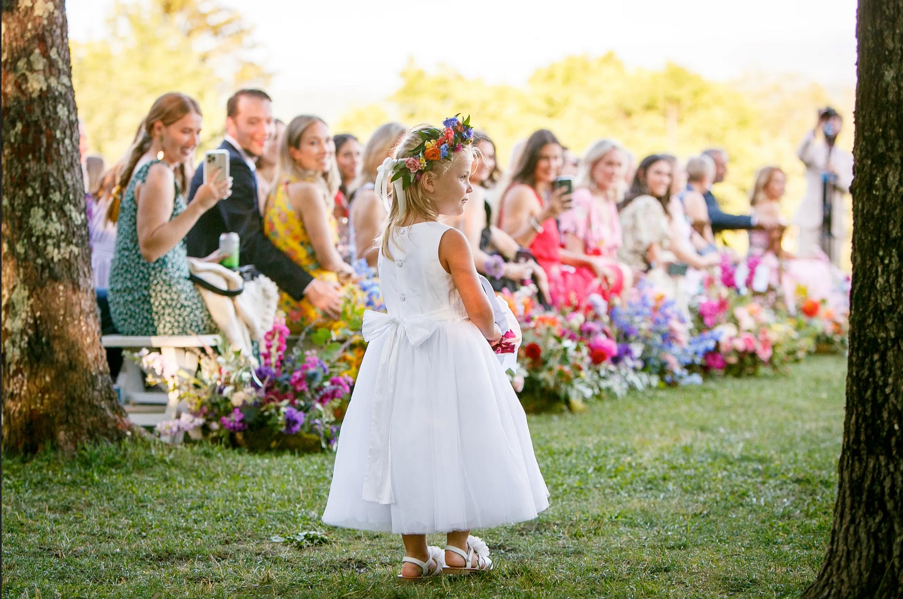 flower girl with colorful flower crown by tin can studios