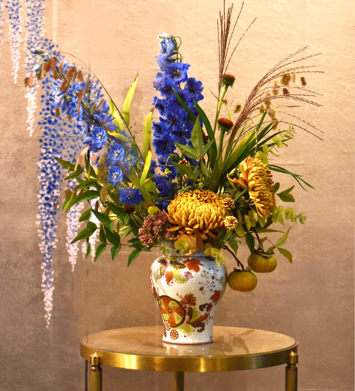 Floral arrangement in the Pseudo Tobacco Leaf Lotus Vase for DeGournay 