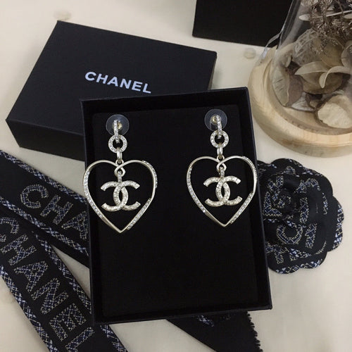 chanel logo dangle earrings