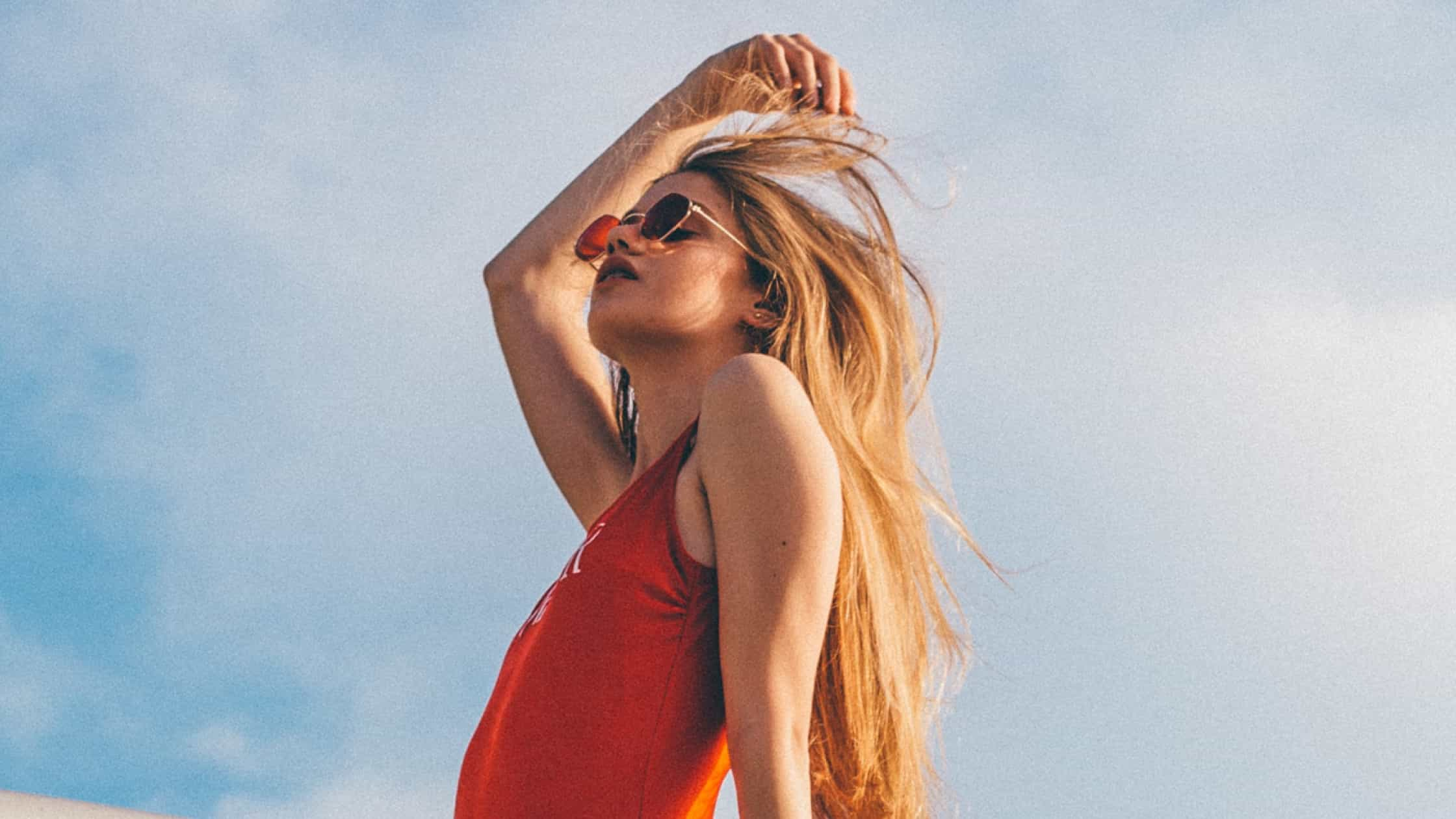 blond girl relaxing at the beach