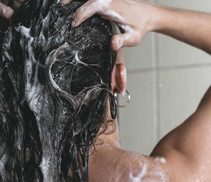 woman washing her hiar