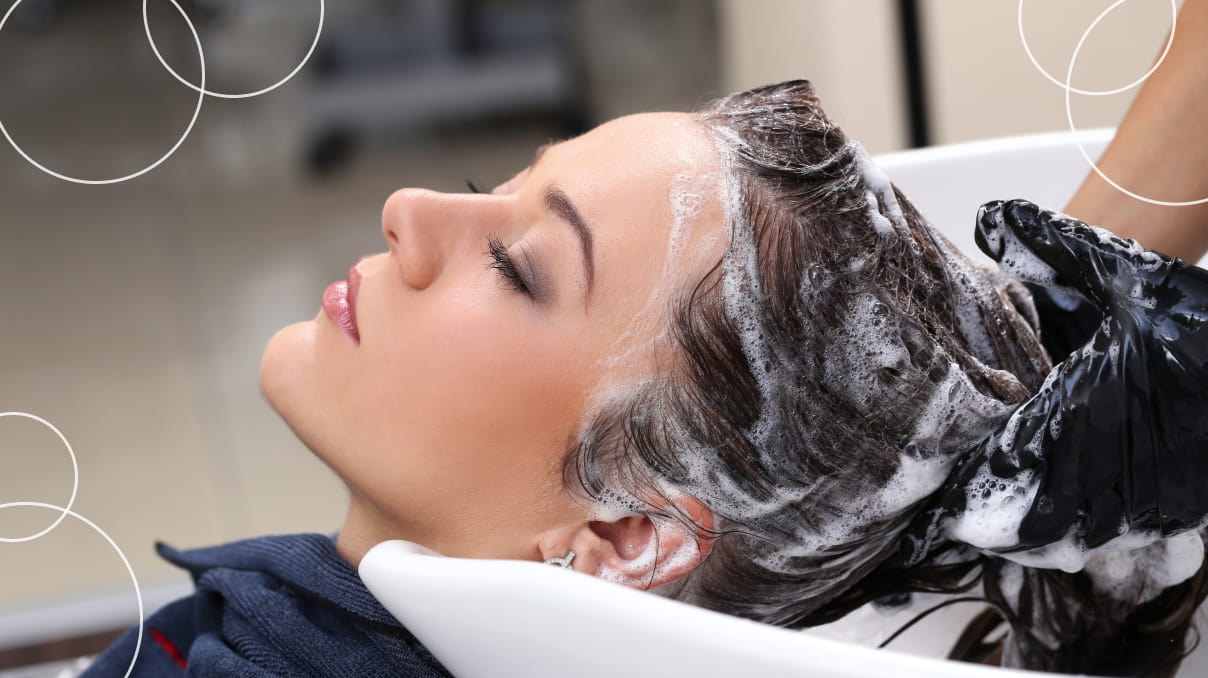 woman getting her hair washed at the the salon