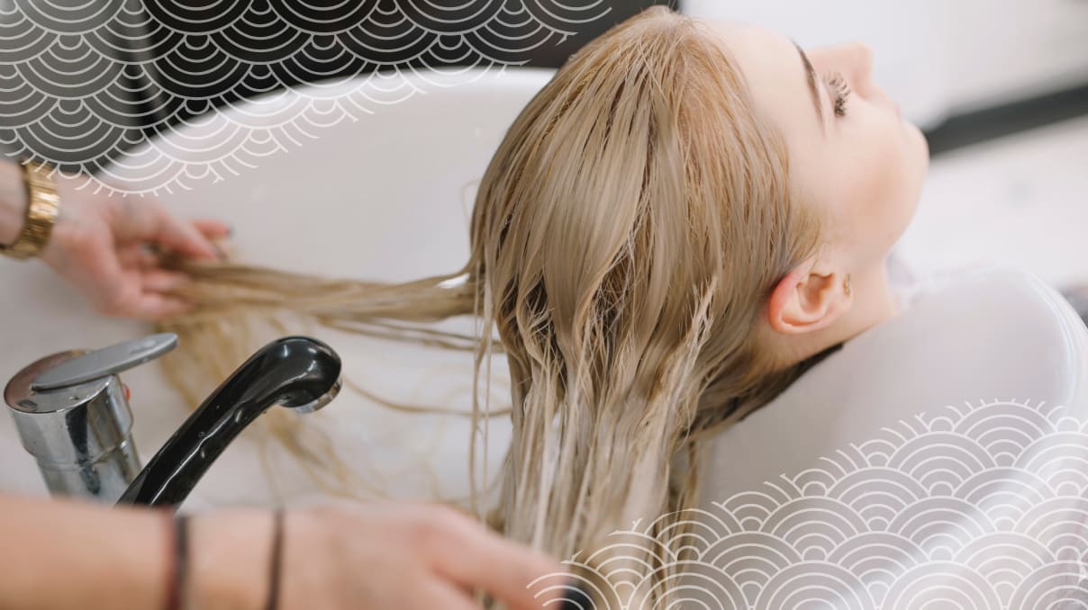 salon customer getting her hair washed