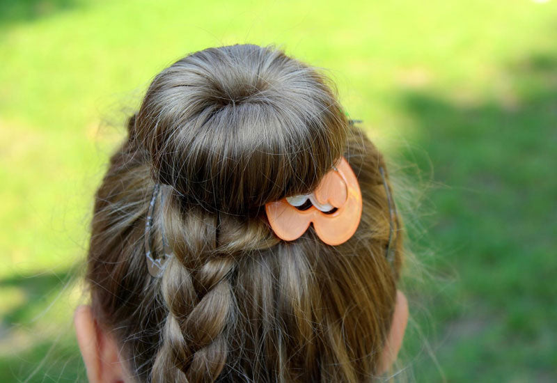Messy bun hairstyle for a wedding