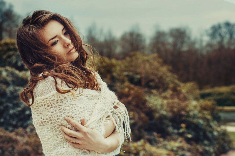 woman relaxing while at the forest