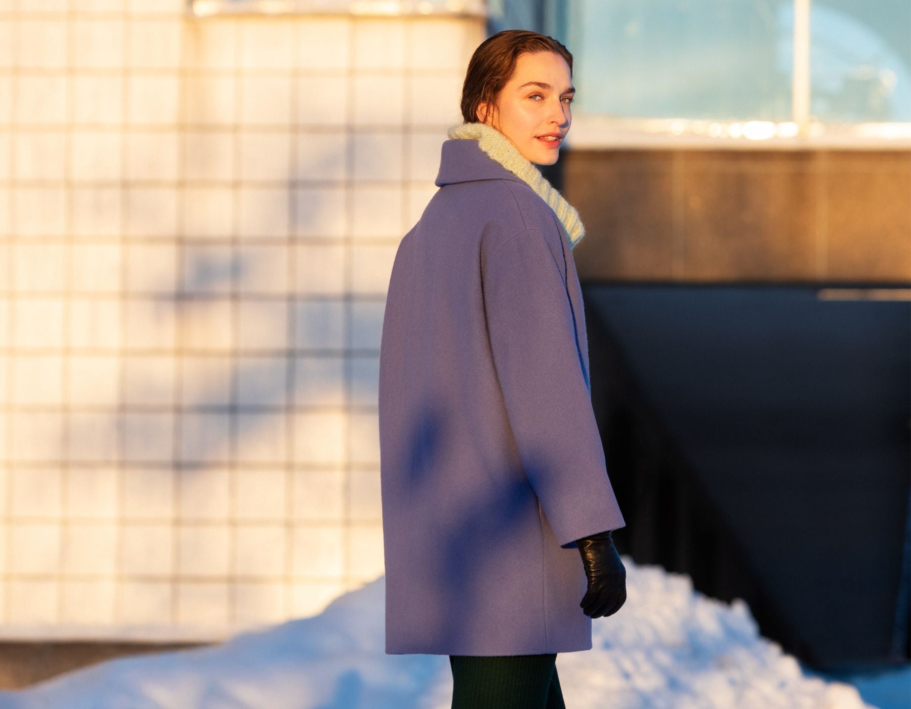 A woman wearing Falla Finland wool jacket