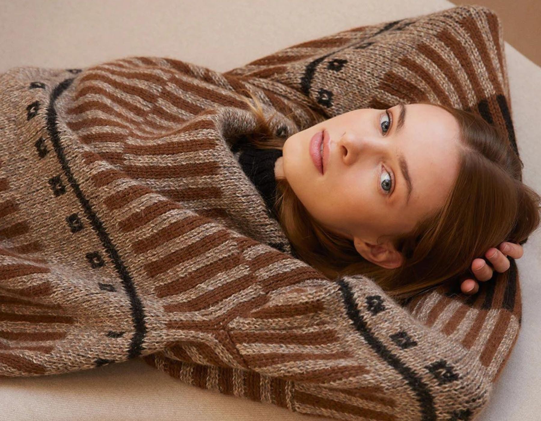 Woman wearing brown The Knotty Ones alpaca wool sweater