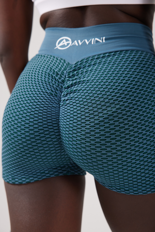 Close up back shot of girl wearing luna scrunch bum shorts in blue