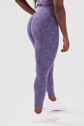 Close up behind shot of girl wearing purple legacy scrunch bum leggings