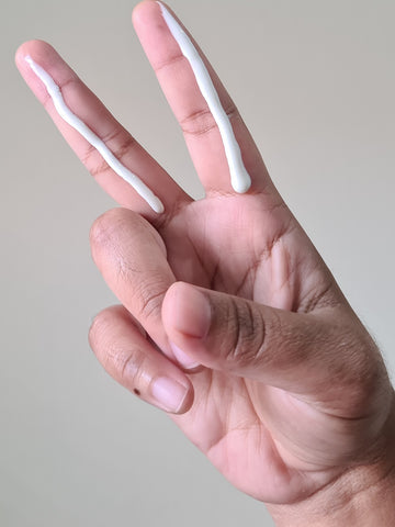 two fingers of sunscreen are needed for the entire head and neck