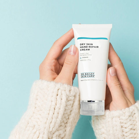 Dry Skin Hand Repair Cream in hand